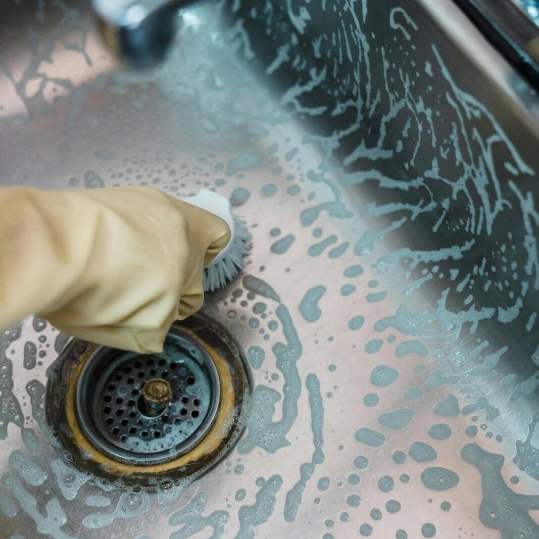 residential-cleaning-dish-sink-scrubbing-soap