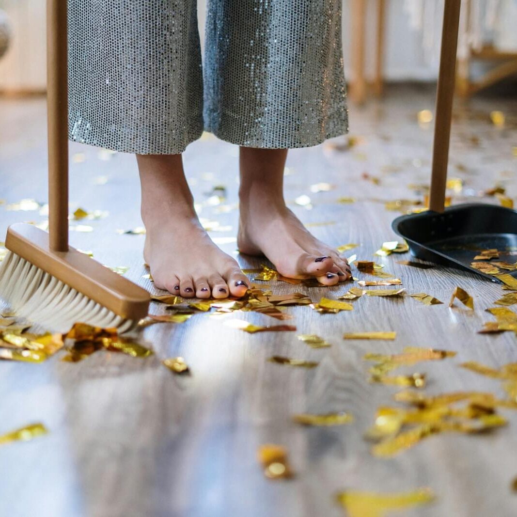residential-cleaning-up-party-debris-barefoot